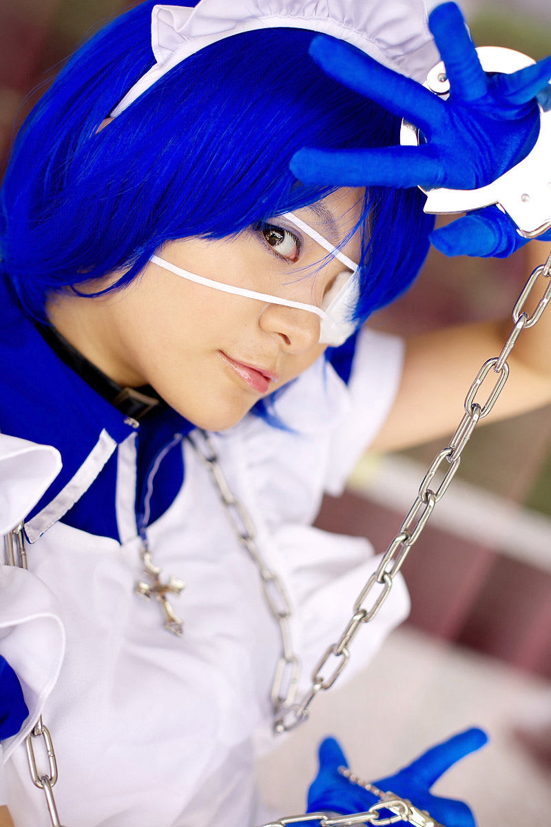 riori, ryomou shimei, ikkitousen, highres, photo (medium), apron, cosplay, cuffs, eyepatch, gloves, handcuffs, maid, maid apron, ryomou shimei (cosplay)