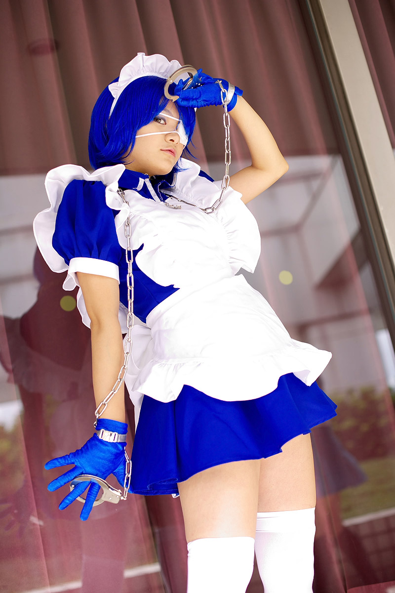 riori, ryomou shimei, ikkitousen, highres, photo (medium), apron, cosplay, cuffs, eyepatch, gloves, handcuffs, maid, maid apron, ryomou shimei (cosplay), thighhighs
