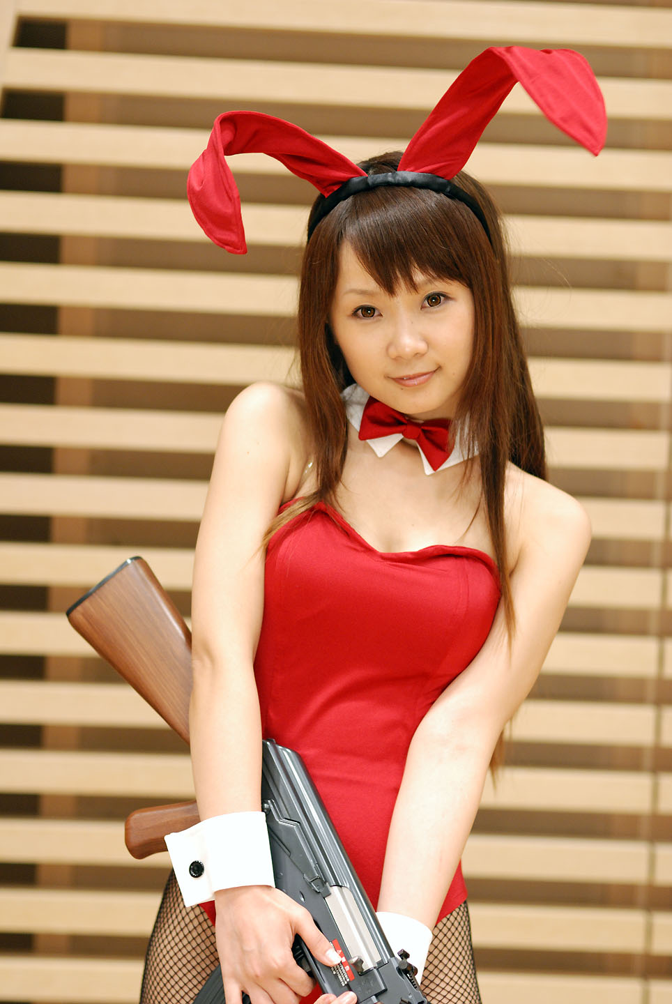 hiromichi, asahina mikuru, suzumiya haruhi no yuuutsu, fishnet legwear, highres, photo (medium), ak-47, animal ears, assault rifle, collar, cosplay, fishnets, gun, kalashnikov, kalashnikov rifle, leotard, rabbit ears, rifle, weapon