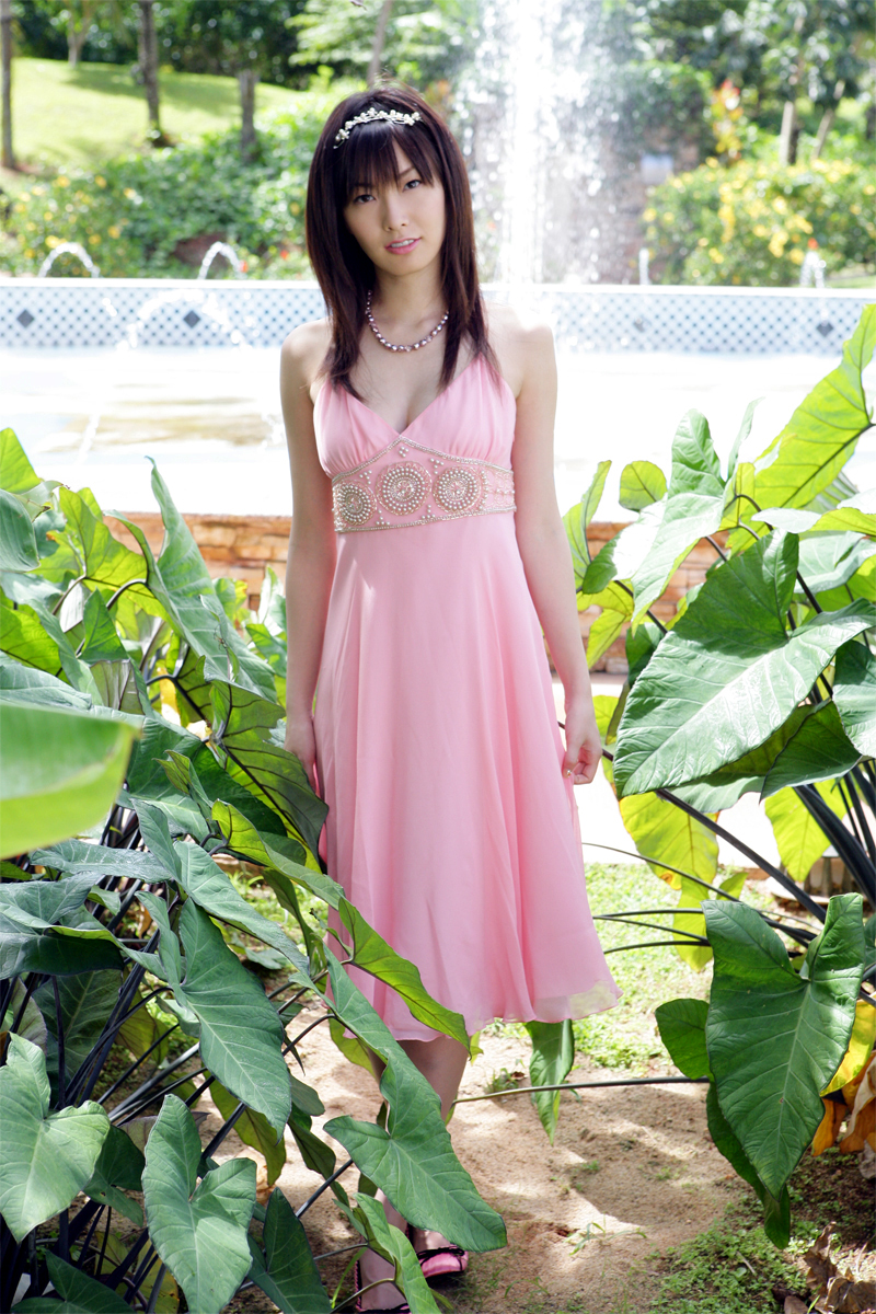 nagasawa nao, highres, photo (medium), 1girl, asian, dress, fountain, hairband, jewelry, looking at viewer, necklace, outdoors, pearl necklace