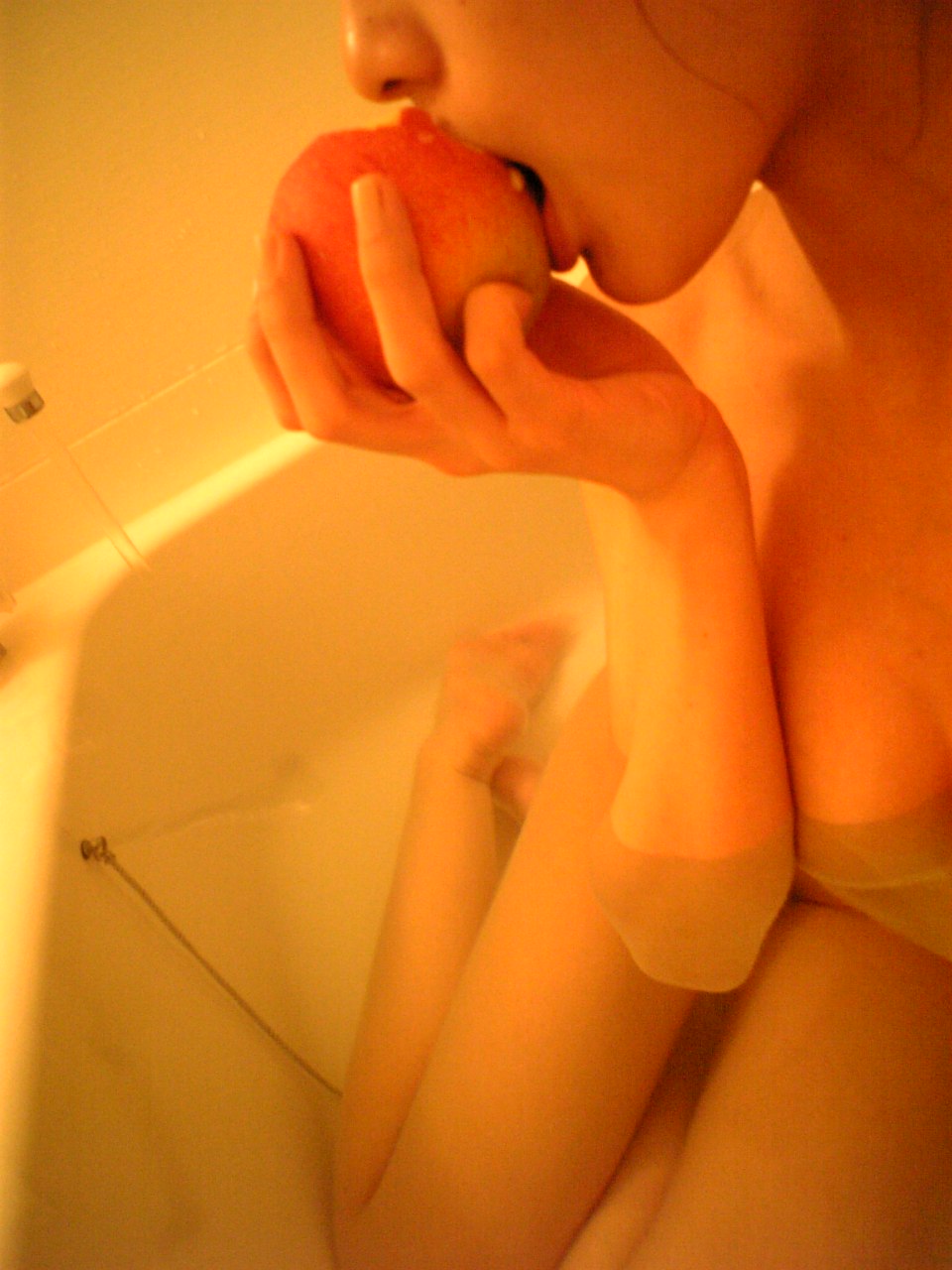 tachibana riko, highres, photo (medium), 1girl, apple, asian, bathtub, dutch angle, female focus, food, fruit, indoors, nude, partially submerged, solo