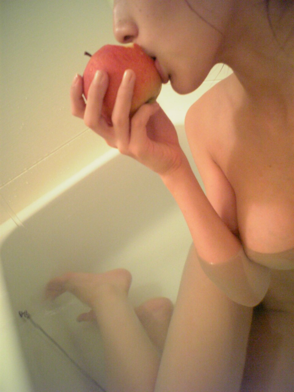 tachibana riko, highres, photo (medium), 1girl, apple, asian, bathtub, female focus, food, fruit, indoors, nude, partially submerged, solo