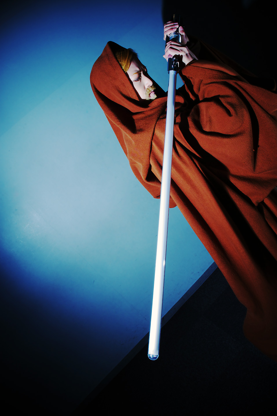 obi-wan kenobi, star wars, highres, photo (medium), beard, cloak, cosplay, energy sword, facial hair, jedi, lightsaber, sakuya siina, sword, weapon