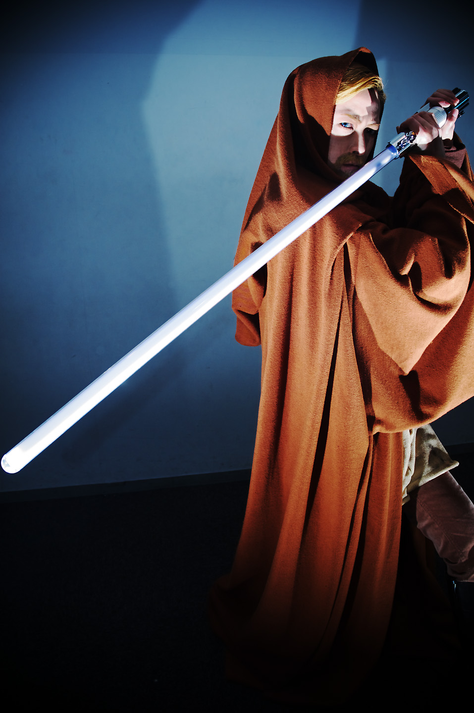 obi-wan kenobi, star wars, highres, photo (medium), beard, boots, cloak, cosplay, energy sword, facial hair, jedi, lightsaber, sakuya siina, sword, weapon