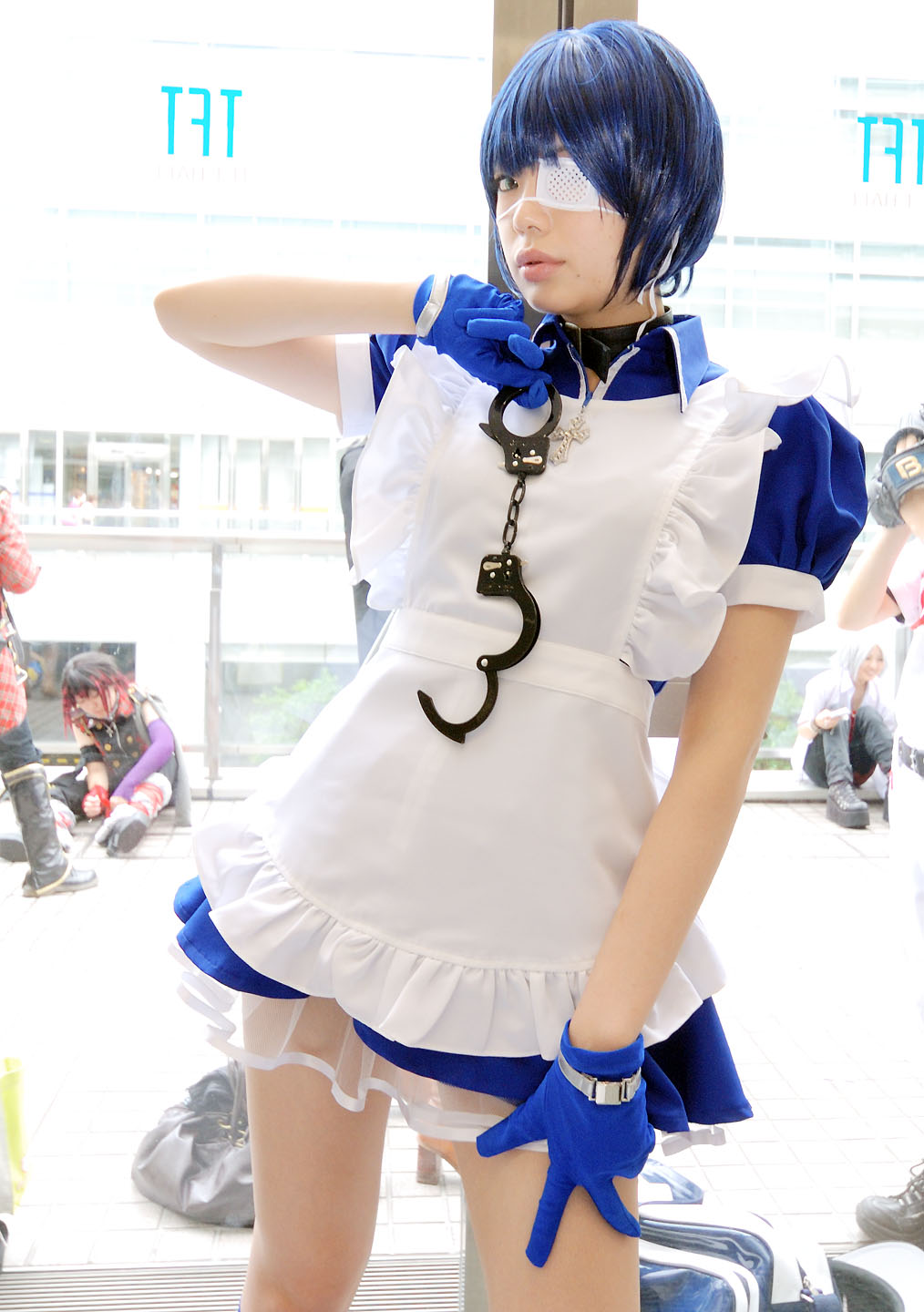 namada, ryomou shimei, ikkitousen, highres, photo (medium), 3girls, apron, asian, blue eyes, blue gloves, blue hair, collar, color contacts, cosplay, cross, cuffs, eyepatch, gloves, handcuffs, looking at viewer, maid, maid apron, multiple girls, puffy short sleeves, puffy sleeves, ryomou shimei (cosplay), short sleeves, solo focus, standing