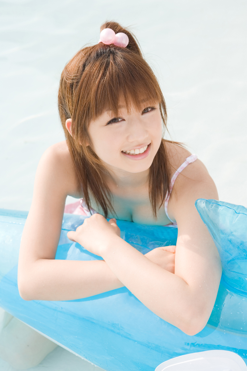 ogura yuuko, autumn breeze, highres, photo (medium), bikini, bikini top only, inflatable dolphin, inflatable toy, miniskirt, polka dot, pool, skirt, swimsuit