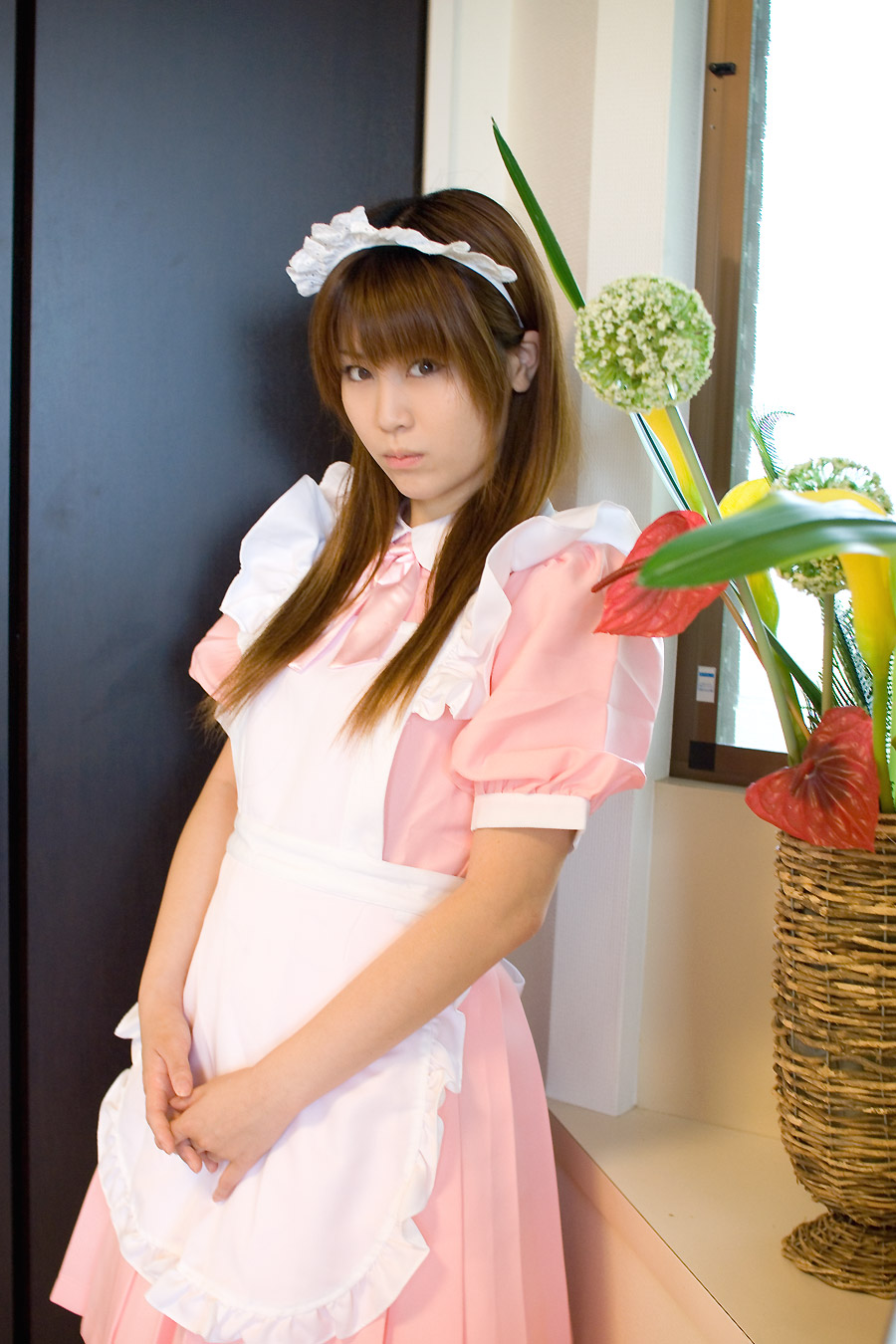 adachi mikki, highres, photo (medium), 1girl, apron, asian, brown hair, cosplay, dyed hair, female focus, indoors, looking at viewer, maid, maid apron, solo