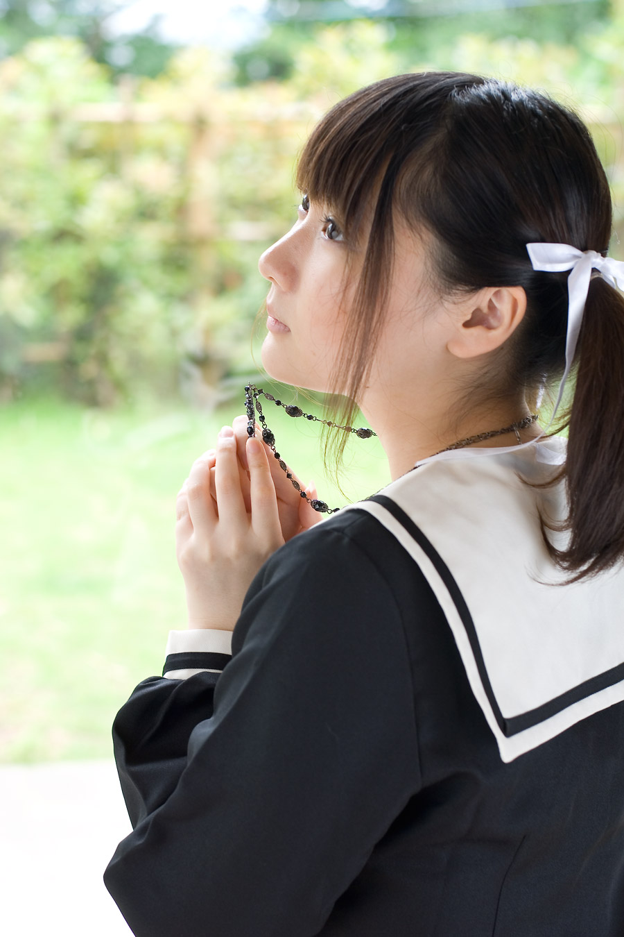 fukuzawa yumi, maria-sama ga miteru, highres, photo (medium), 1girl, asian, cosplay, female focus, fukuzawa yumi (cosplay), hair ribbon, outdoors, ribbon, rosary, sailor, school uniform, serafuku, solo, twintails