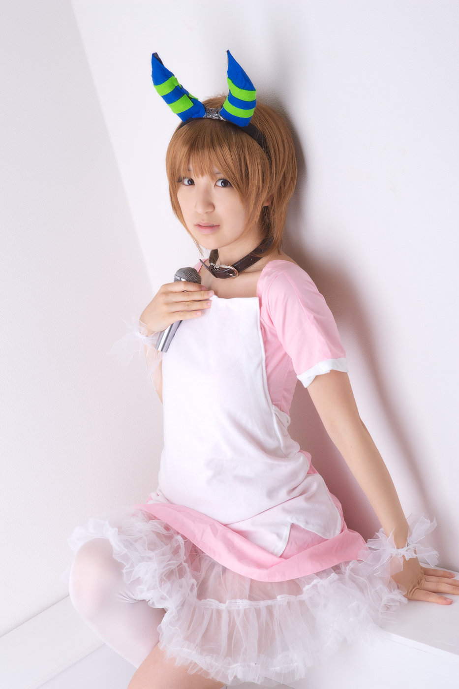 richi, linda (boku to maou), boku to maou, highres, photo (medium), apron, collar, cosplay, dress, horns, microphone, single thighhigh, thighhighs