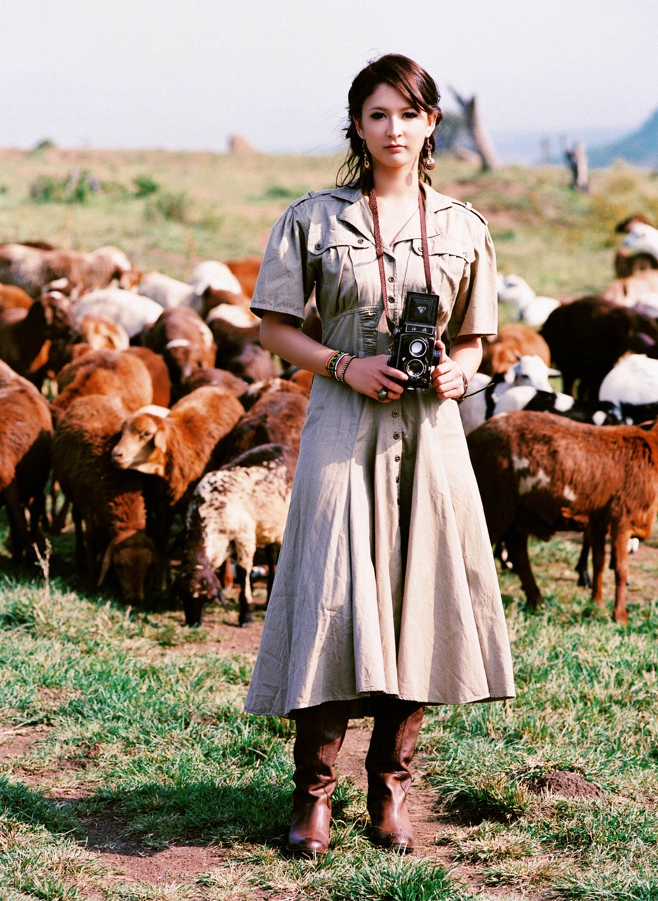 leah dizon, highres, photo (medium), africa, boots, camera, dress, goats, kenya