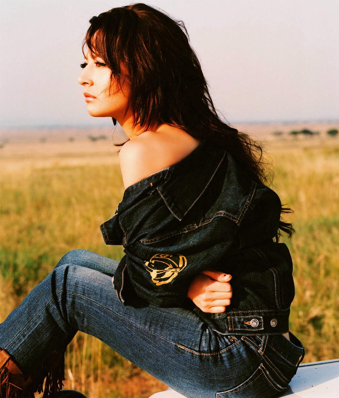 leah dizon, highres, photo (medium), africa, boots, denim, denim jacket, jacket, jeans, kenya, pants