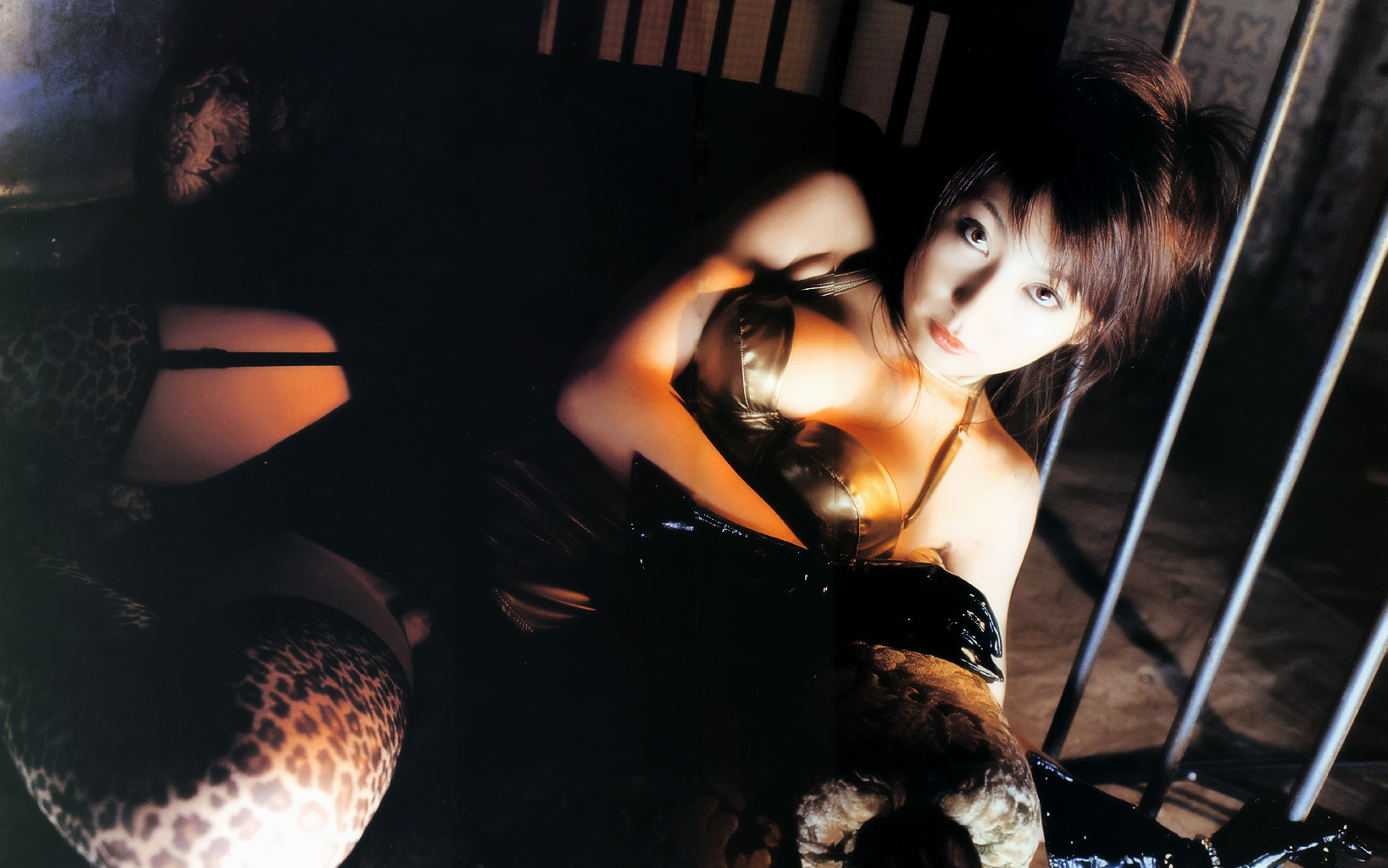 kumada yoko, highres, photo (medium), 7 days 7 colors, asian, cage, garter belt, halterneck, leopard print, thighhighs