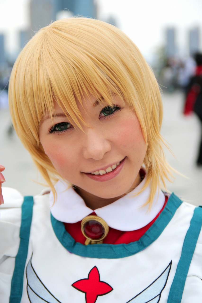 chippi, erstin ho, my-otome, highres, photo (medium), 1girl, 2007, apron, asian, blonde hair, blue eyes, color contacts, cosplay, erstin ho (cosplay), female focus, looking at viewer, maid, maid apron, outdoors, school uniform, short hair, solo, watermark, web address