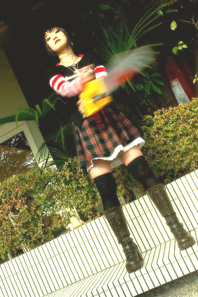 omi gibson, frederica sawyer, black lagoon, striped, photo (medium), 1girl, asian, boots, chainsaw, cosplay, female focus, frederica sawyer (cosplay), lace-up boots, plaid clothes, plaid skirt, pleated skirt, skirt, thighhighs