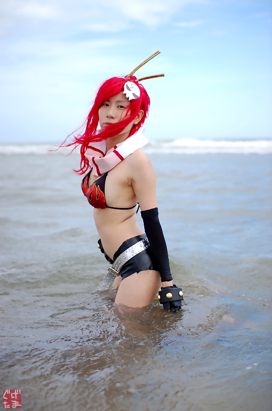 yoko littner, tengen toppa gurren lagann, photo (medium), arm warmers, beach, bikini, bikini top only, breasts, chopsticks, cleavage, cosplay, fingerless gloves, gloves, kudou rou, ocean, red hair, scarf, shorts, swimsuit, wet