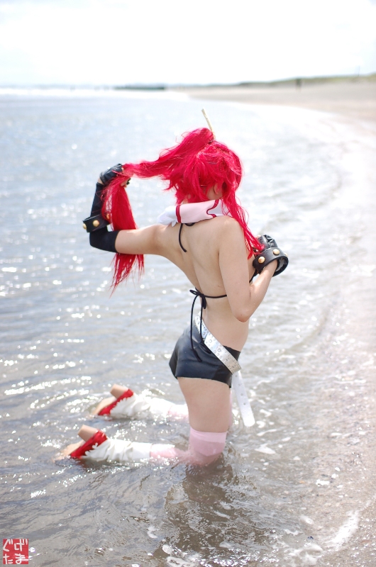 yoko littner, tengen toppa gurren lagann, photo (medium), arm warmers, ass, beach, bikini, bikini top only, boots, chopsticks, cosplay, fingerless gloves, gloves, kudou rou, ocean, red hair, scarf, shorts, swimsuit, thighhighs, wet