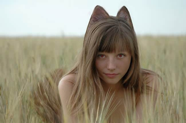 holo, spice and wolf, cosplay photo, jpeg artifacts, photo (medium), third-party edit, 1girl, animal ears, blurry, cosplay, depth of field, female focus, holo (cosplay), nude, red eyes, solo, tail, wolf ears, wolf tail