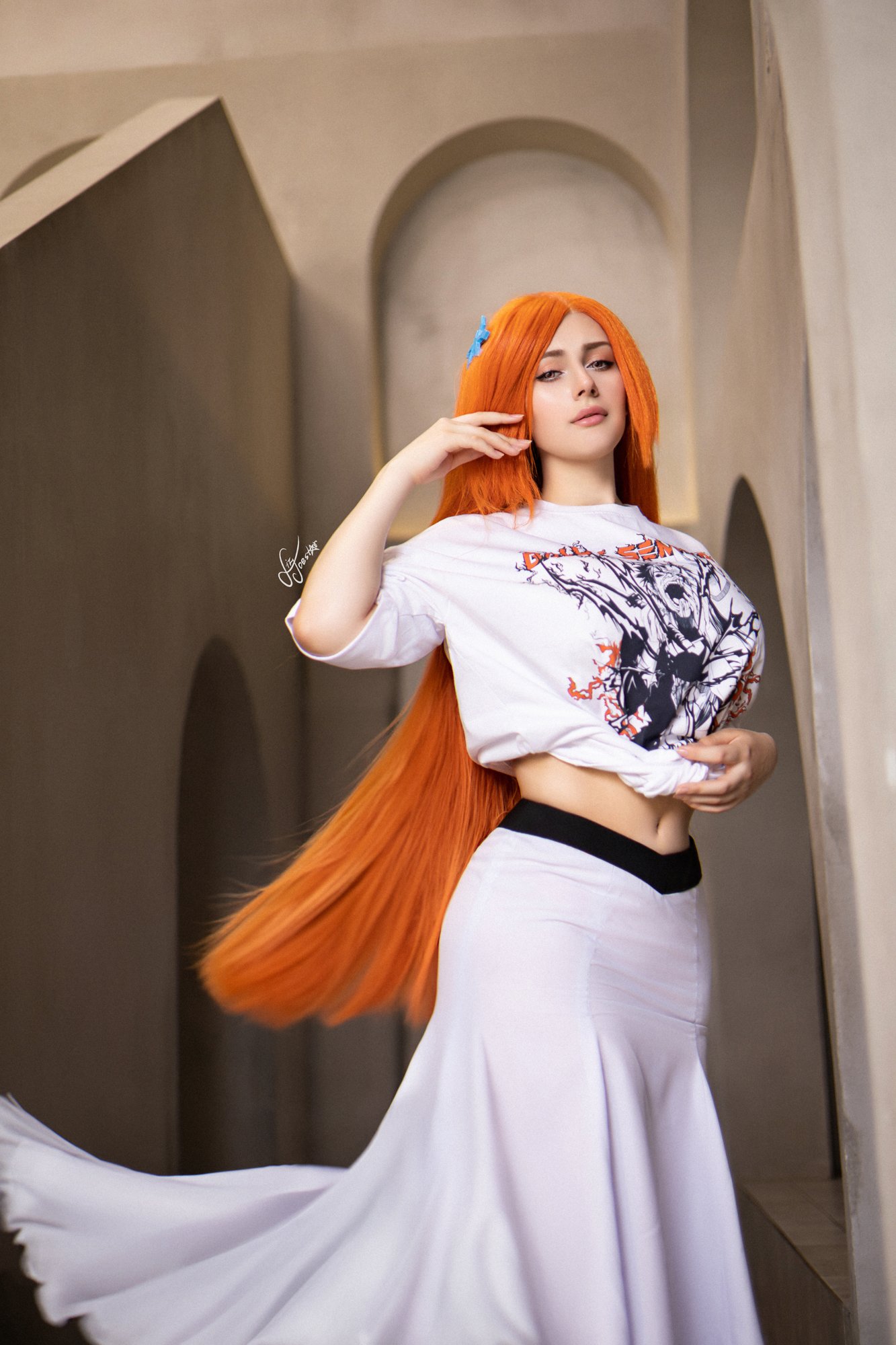 liz joestar, inoue orihime, bleach, bleach: sennen kessen-hen, commentary, cosplay photo, english commentary, photo (medium), 2024, breasts, brown eyes, cosplay, hair ornament, hairclip, indoors, inoue orihime (cosplay), large breasts, long hair, long skirt, navel, orange hair, shirt, skirt, solo, standing, white shirt, wig