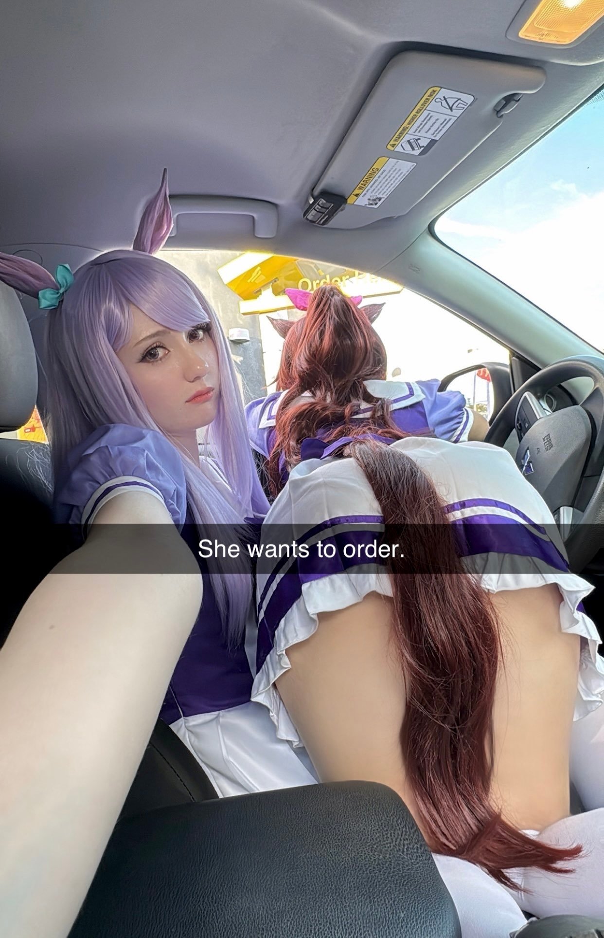 mejiro mcqueen (umamusume), tokai teio (umamusume), mitsubishi motors, umamusume, commentary, cosplay photo, highres, photo (medium), symbol-only commentary, 2girls, animal ears, ass, brown hair, car, car interior, closed mouth, galpoyoo, he wants to order (meme), horse ears, horse girl, horse tail, long hair, looking at viewer, meme, motor vehicle, multiple girls, puffy short sleeves, puffy sleeves, purple hair, purple sailor collar, sailor collar, school uniform, short sleeves, socks, tail, thighs, tracen school uniform, white socks