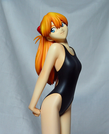 souryuu asuka langley, neon genesis evangelion, photo (medium), 1girl, black one-piece swimsuit, blue eyes, breasts, female focus, figure, hair ornament, interface headset (evangelion), long hair, looking to the side, medium breasts, one-piece swimsuit, orange hair, smile, solo, standing, stretching, swimsuit