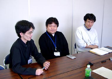 zun, real life, lowres, photo (medium), 3boys, asian, male focus, meeting, multiple boys, sitting, table