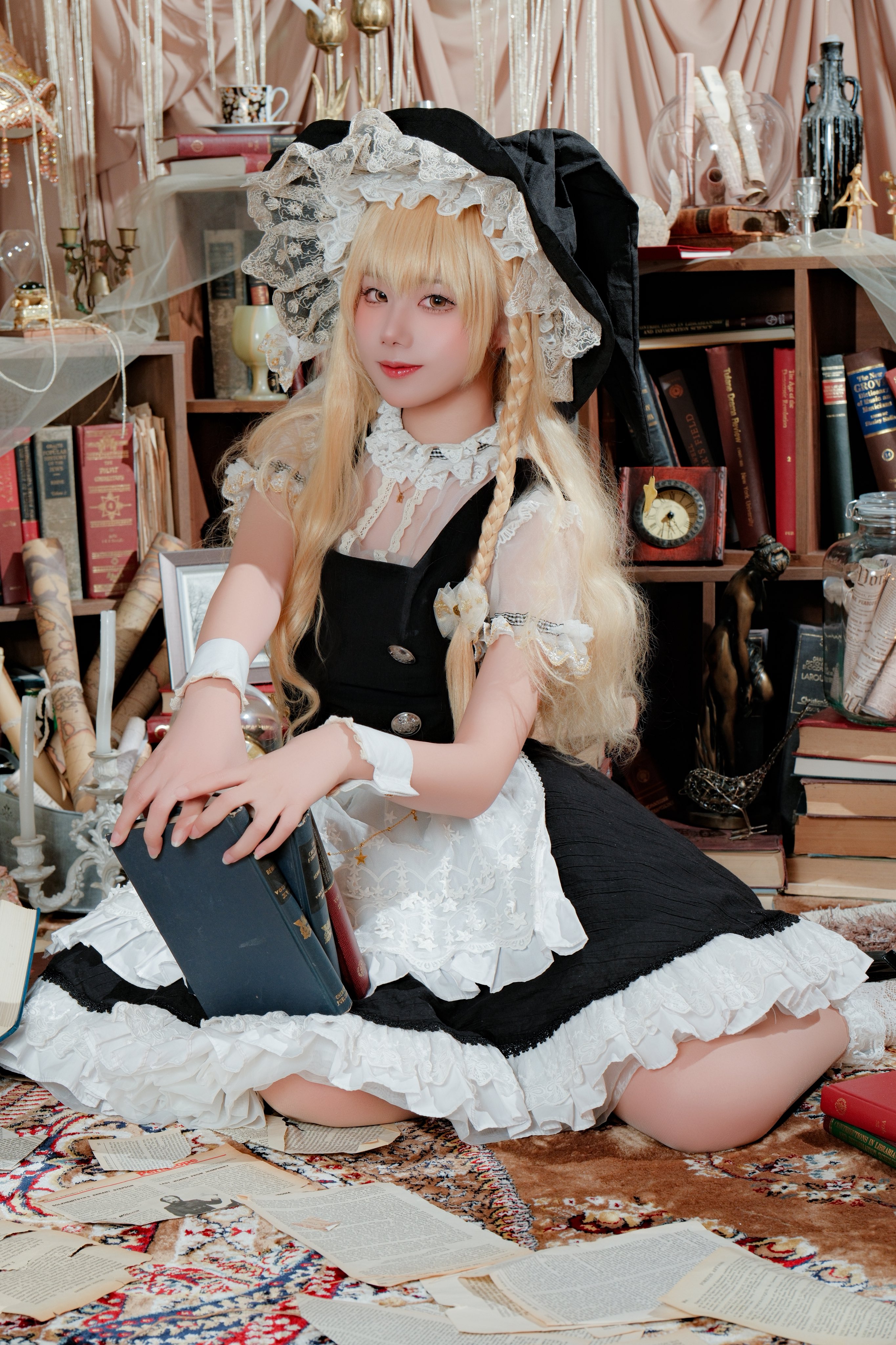 kirisame marisa, touhou, absurdres, cosplay photo, highres, photo (medium), 1girl, apron, black dress, blonde hair, book, bookshelf, braid, cosplay, dress, hat, holding, holding book, long hair, looking at viewer, short sleeves, side braid, sinkai cos, solo, waist apron, white apron, witch hat