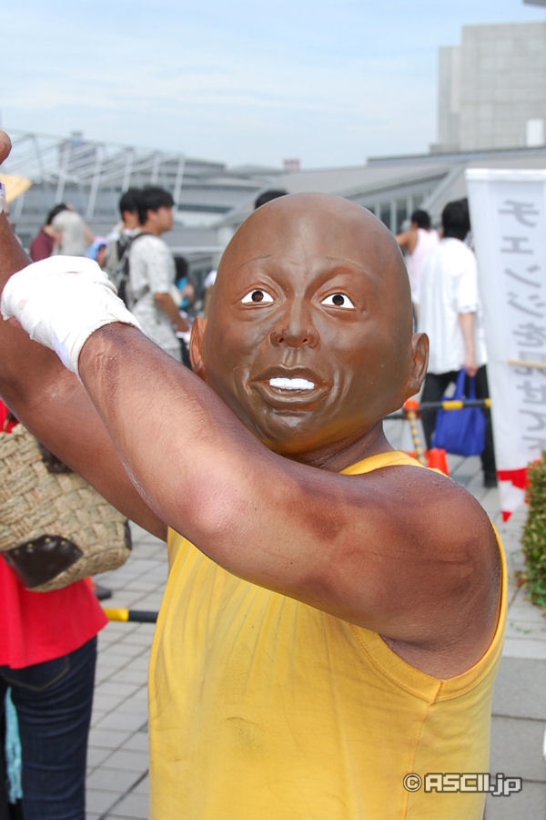 billy blanks, real life, off-topic, photo (medium), 1boy, asian, cosplay, dark-skinned male, dark skin, day, mask, outdoors, solo focus, what