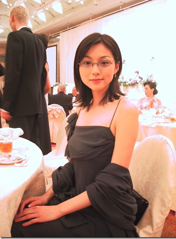 non-web source, off-topic, photo (medium), tagme, 1girl, asian, dress, glasses, jacket, solo focus, suit jacket, unworn jacket