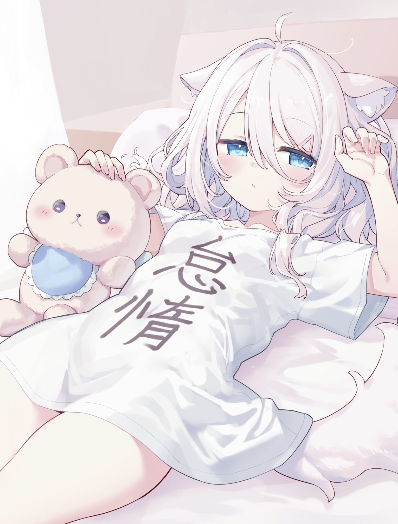 original, highres, 1girl, ahoge, animal ear fluff, animal ears, blue eyes, blush, breasts, closed mouth, clothes writing, dog ears, hair between eyes, hair ornament, hairclip, looking at viewer, lying, nemuishiina, on back, pillow, shirt, short sleeves, small breasts, solo, stuffed animal, stuffed toy, tail, teddy bear, white hair, white shirt