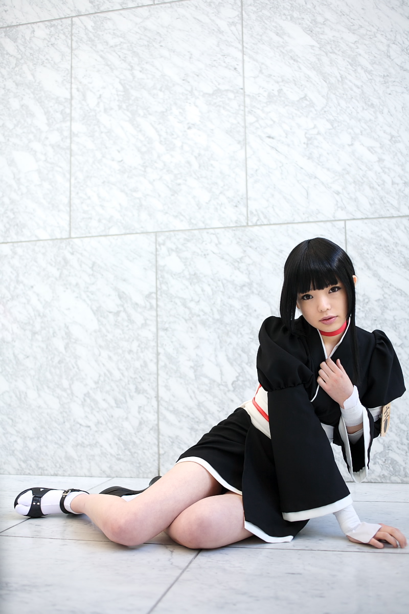 namada, kurotsuchi nemu, bleach, black footwear, white legwear, cosplay photo, highres, photo (medium), 1girl, asian, black hair, black kimono, blunt bangs, braid, choker, cosplay, female focus, japanese (nationality), japanese clothes, kimono, looking at viewer, on floor, parted lips, short kimono, sidelocks, single braid, sitting, solo, tabi, yokozuwari