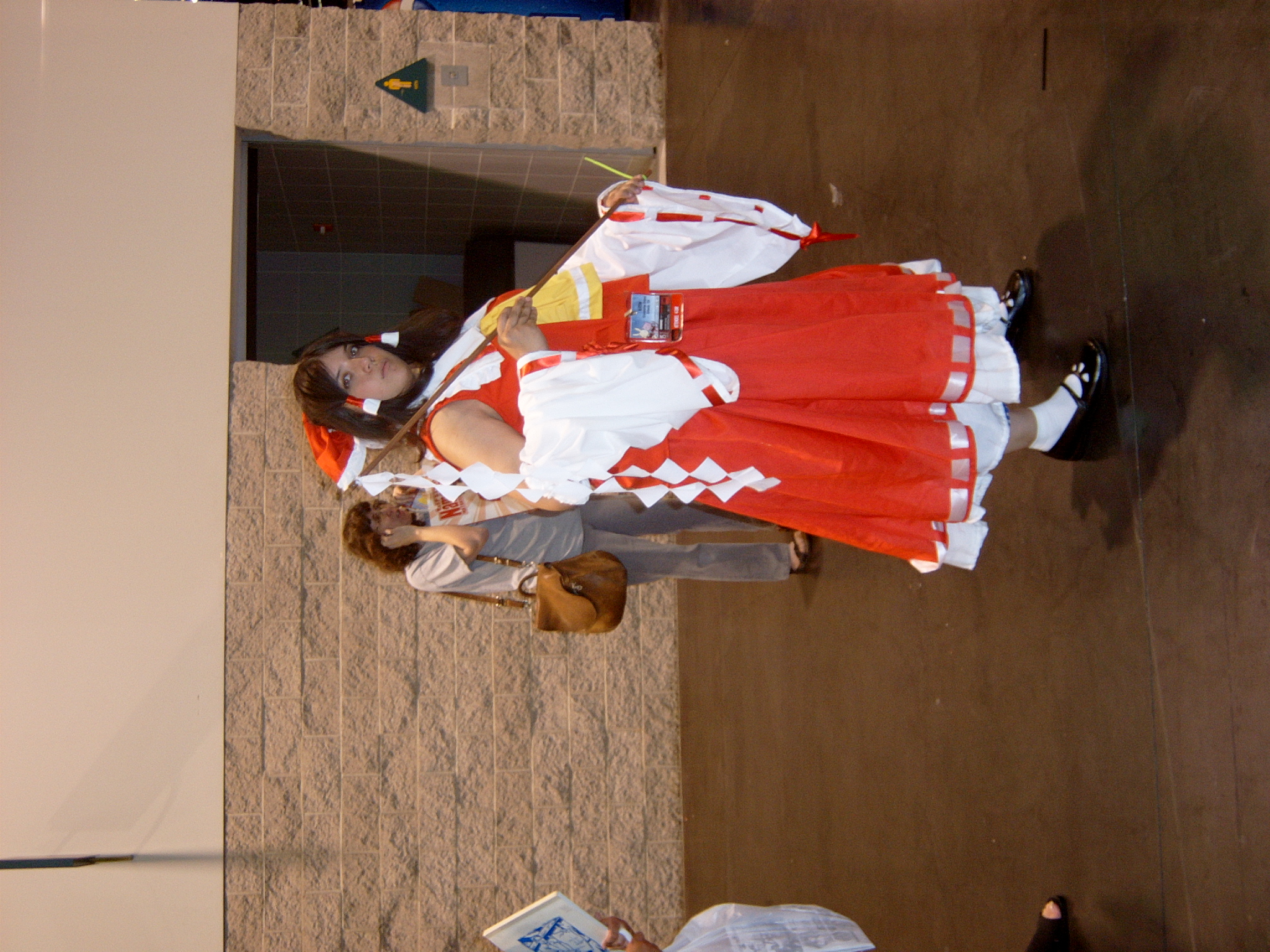 hakurei reimu, touhou, cosplay photo, highres, non-web source, photo (medium), 1girl, cosplay, female focus, hakurei reimu (cosplay), socks, solo focus