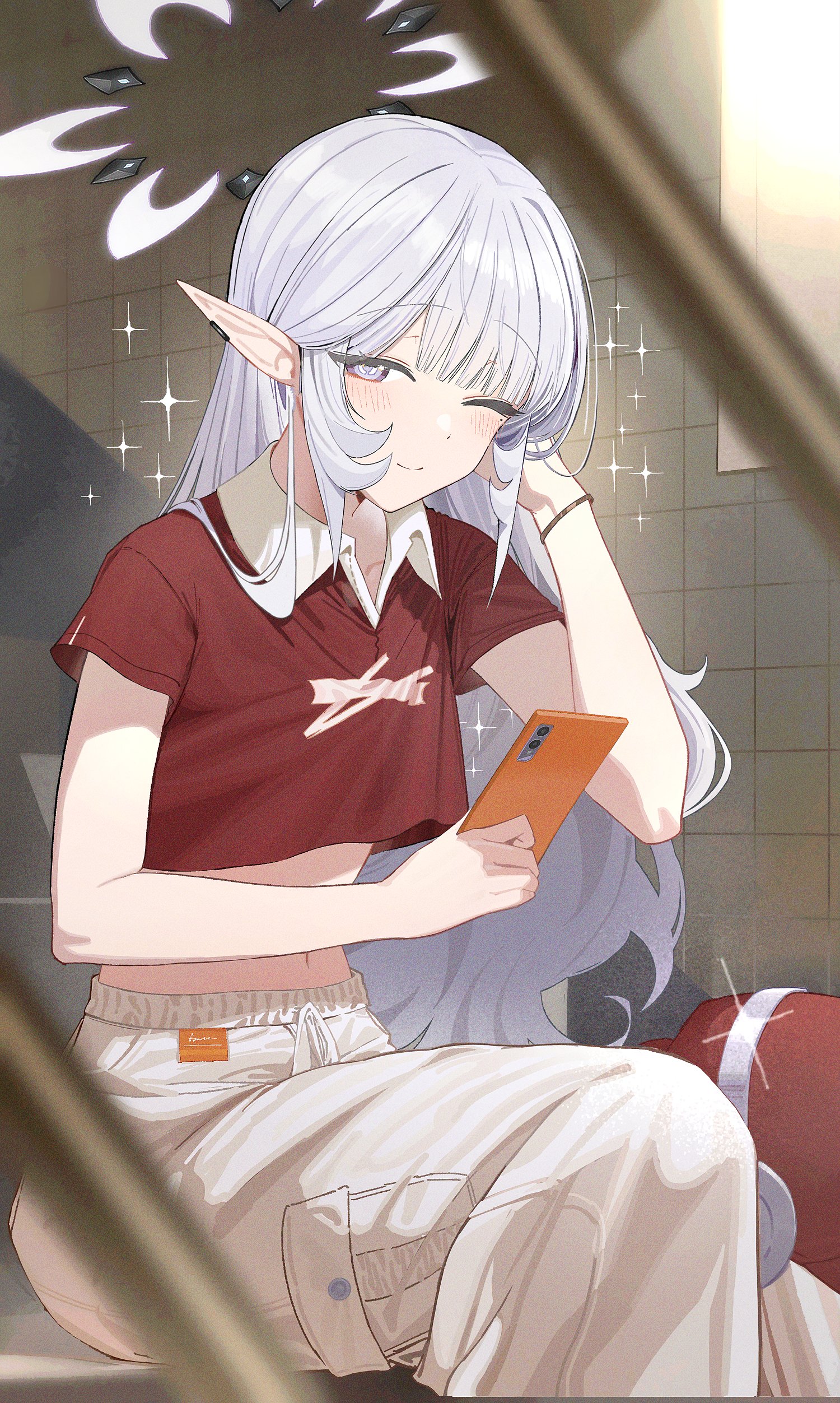 zanya 000, himari (blue archive), blue archive, absurdres, highres, 1girl, alternate costume, blurry, blurry foreground, blush, casual, cellphone, closed mouth, crop top, cropped shirt, earclip, grey hair, halo, holding, holding phone, long hair, looking at viewer, mole, mole under eye, navel, one eye closed, pants, phone, pointy ears, purple eyes, red shirt, shirt, short sleeves, sitting, smartphone, solo, white pants