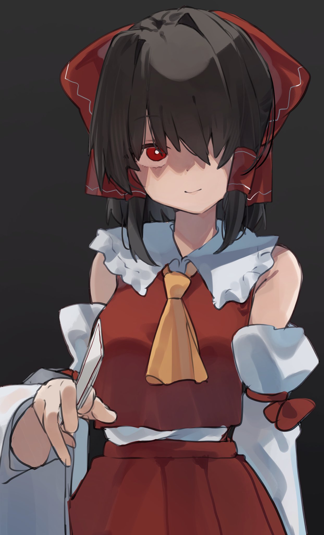higa (gominami), hakurei reimu, touhou, highres, 1girl, ascot, bare shoulders, bow, bright pupils, brown hair, closed mouth, collared shirt, dark background, detached sleeves, hair between eyes, hair tubes, holding, holding ofuda, looking at viewer, medium hair, ofuda, one eye covered, red bow, red eyes, red shirt, red skirt, shaded face, shirt, skirt, sleeveless, sleeveless shirt, smile, solo, white pupils, yellow ascot