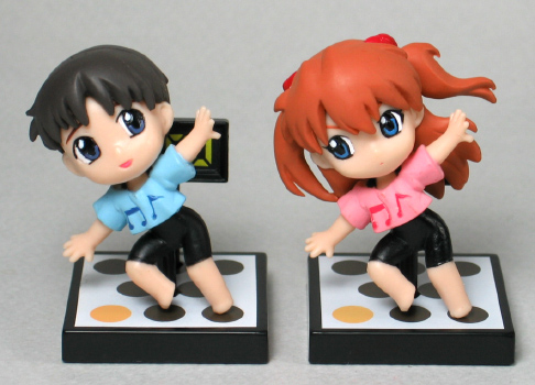 ikari shinji, souryuu asuka langley, neon genesis evangelion, petit eva: evangelion@school, lowres, photo (medium), 00s, 1boy, 1girl, chibi, dance pad, dancing, figure, figure (medium)