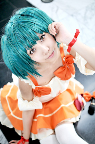 ranka lee, macross, macross frontier, cosplay photo, lowres, photo (medium), 1girl, asian, cosplay, female focus, shirt, skirt, solo, thighhighs