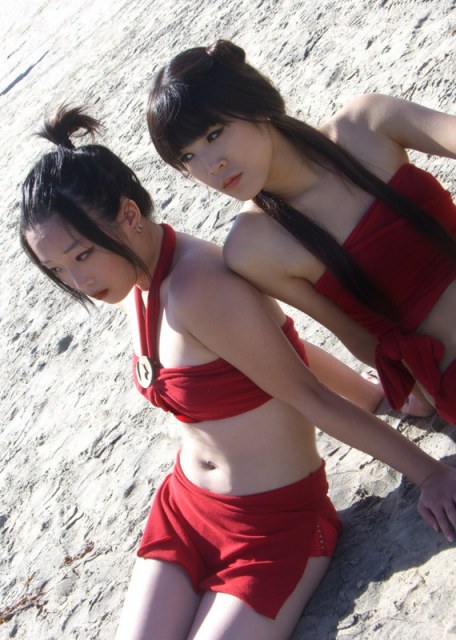 azula, mai (avatar), avatar: the last airbender, avatar legends, photo (medium), beach, black hair, cosplay, flat chest, long hair, midriff, sand, sitting