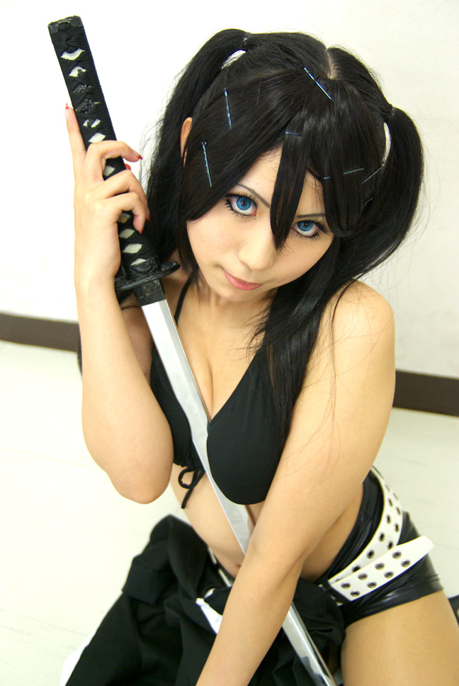 black rock shooter, vocaloid, cosplay photo, photo (medium), 1girl, asian, bikini, bikini top only, black hair, blue eyes, breast press, breasts, contact lens, cosplay, female focus, katana, large breasts, long hair, shorts, solo, swimsuit, sword, twintails, weapon