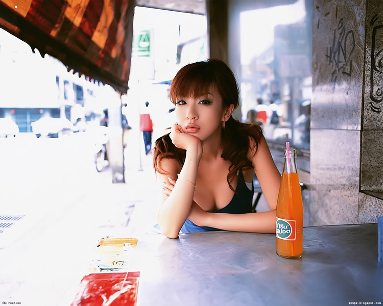 photo (medium), 1girl, asian, black eyes, bracelet, breasts, cleavage, drinking straw, head rest, jewelry, large breasts, long hair, looking at viewer, outdoors, softdrink, solo focus, table