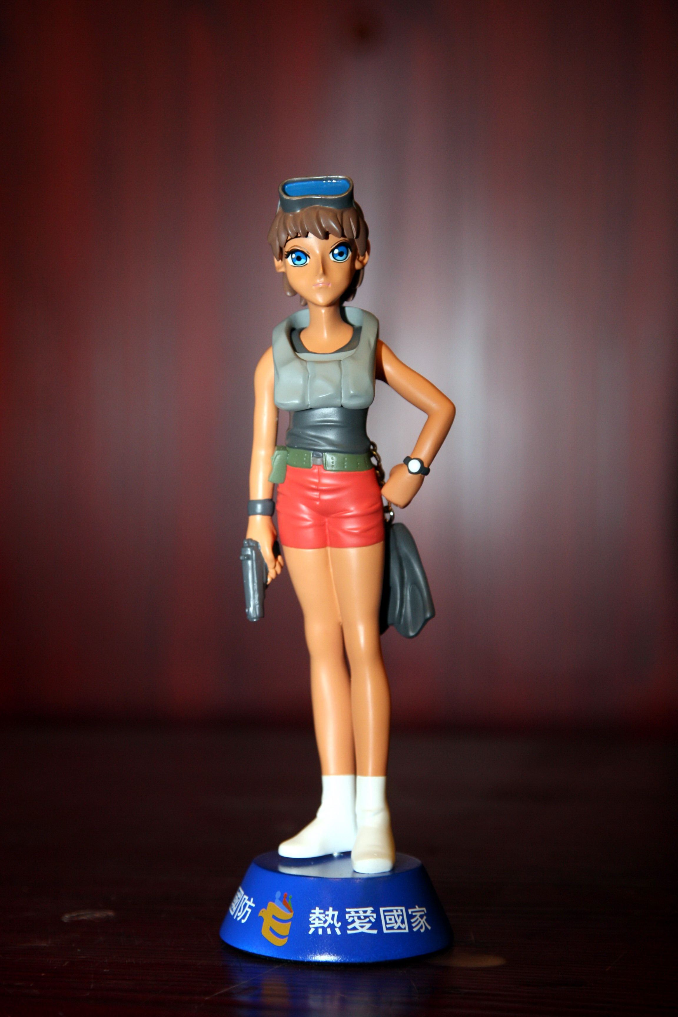 absurdres, highres, photo (medium), tagme, 1girl, blue eyes, female focus, figure, gun, solo, weapon