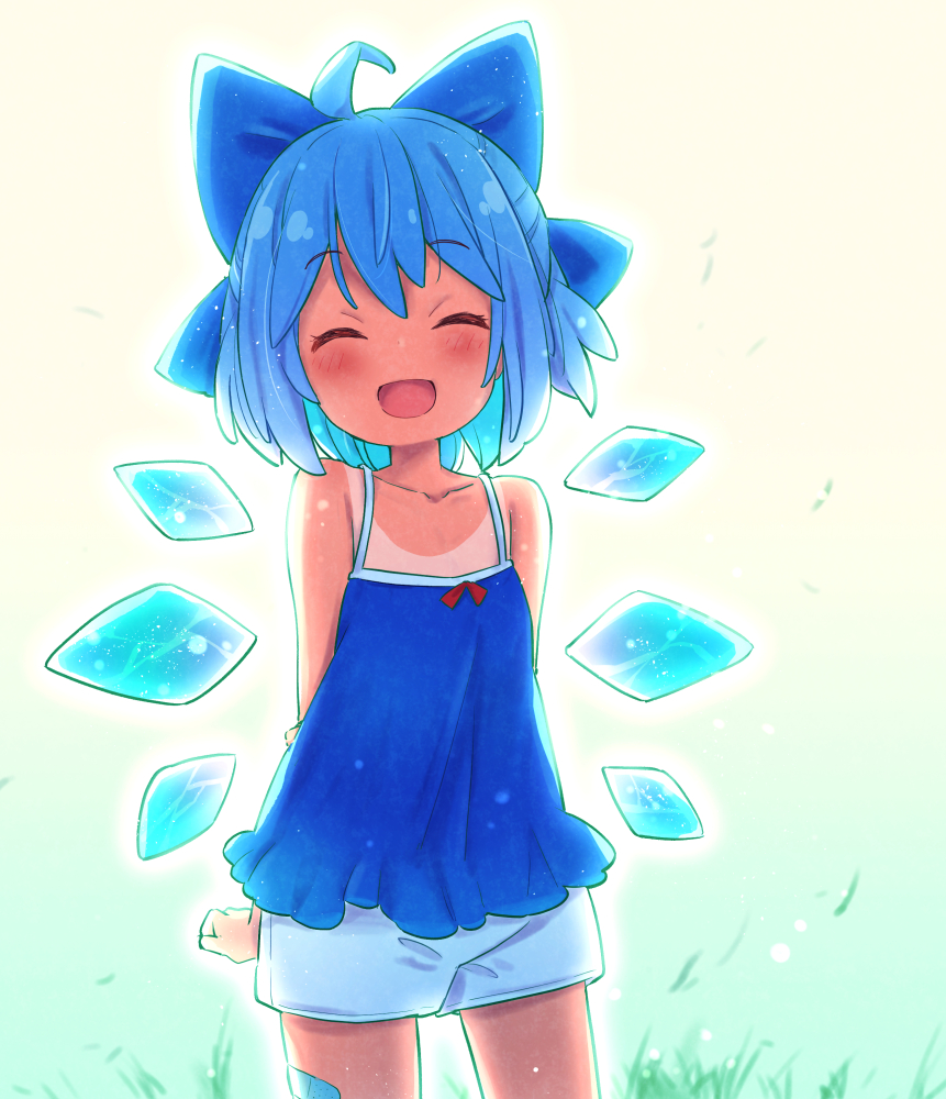 tanasuke, cirno, tanned cirno, touhou, commentary request, 1girl, :d, ahoge, arms behind back, backlighting, bandage on thigh, bare shoulders, blue bow, blue camisole, blue hair, blue shorts, blush, bow, camisole, closed eyes, collarbone, cowboy shot, detached wings, grass, green background, hair bow, holding own arm, ice, ice wings, medium hair, open mouth, short shorts, shorts, smile, solo, tan, tanline, thighs, wings
