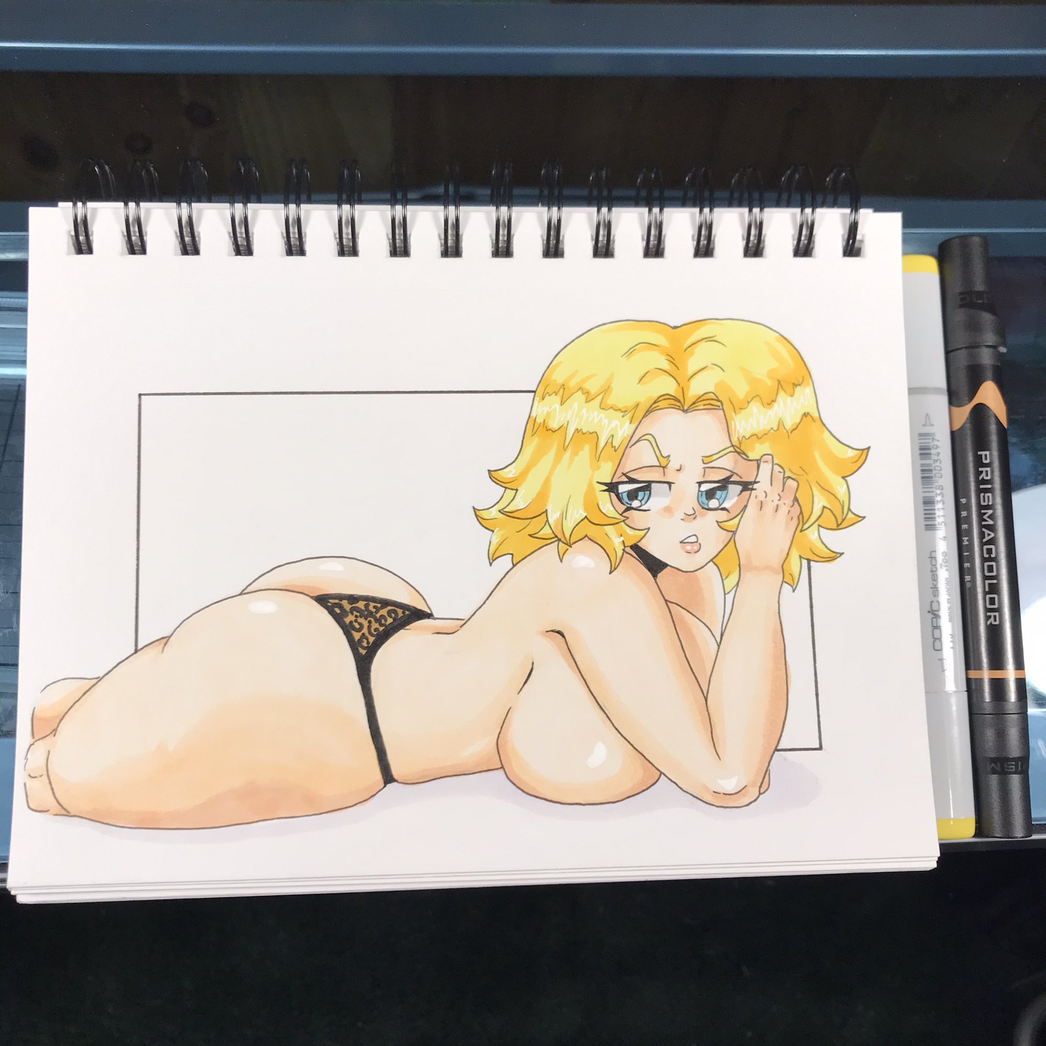 original, commentary, english commentary, highres, marker (medium), pen (medium), photo (medium), traditional media, 1girl, animal print, ass, blonde hair, blue eyes, breasts, huge breasts, kaitlin (northernjdog), large breasts, leopard print, looking to the side, lying, marker, no bra, no pants, northernjdog, on stomach, pinup (style), shiny skin, short hair, sketchbook, solo, thong, topless female
