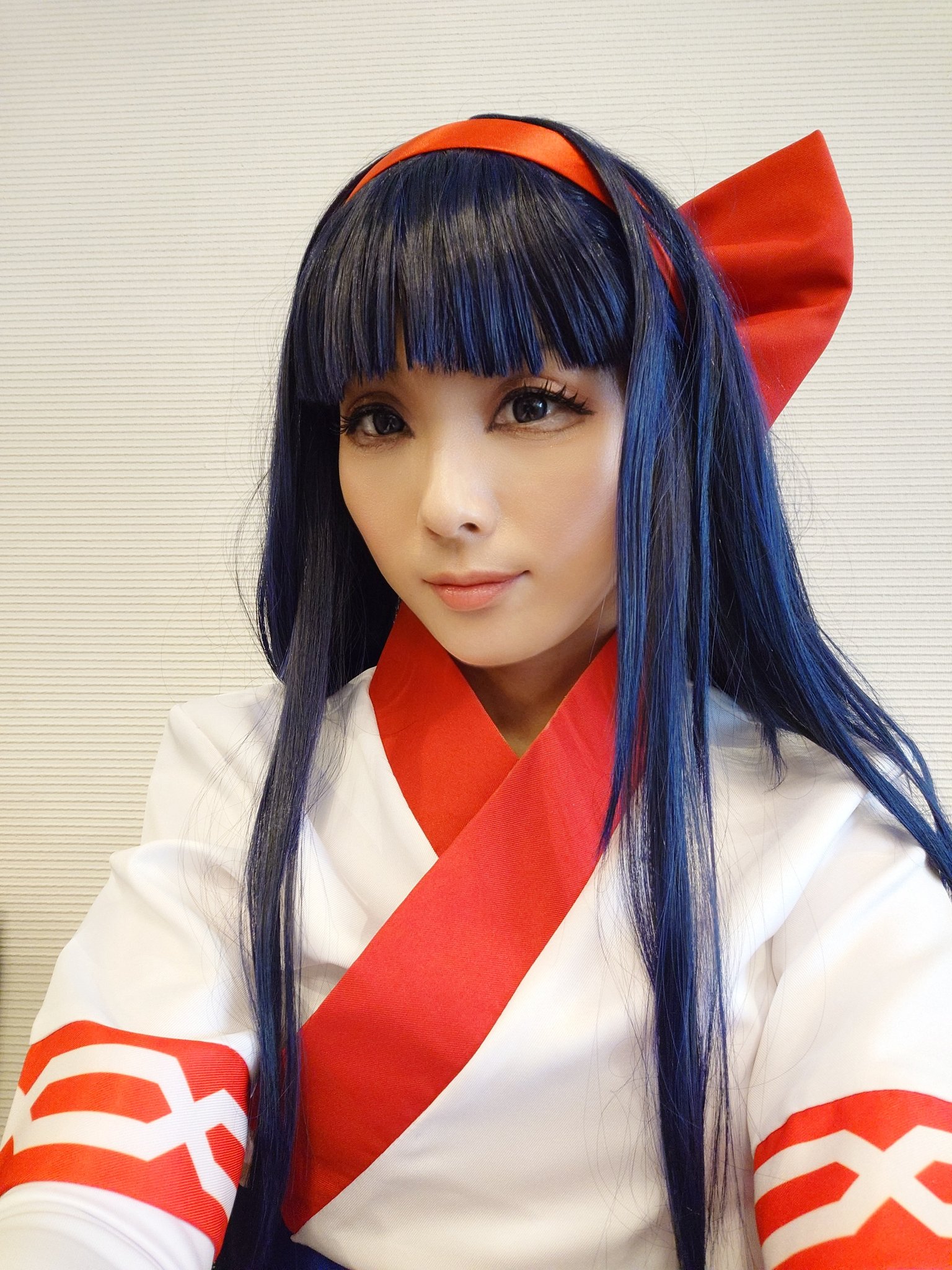 nakoruru, samurai spirits, snk, the king of fighters, highres, 1girl, ainu clothes, asian, blue hair, breasts, brown eyes, cosplay, hair ribbon, japanese (nationality), long hair, ribbon, small breasts, smile