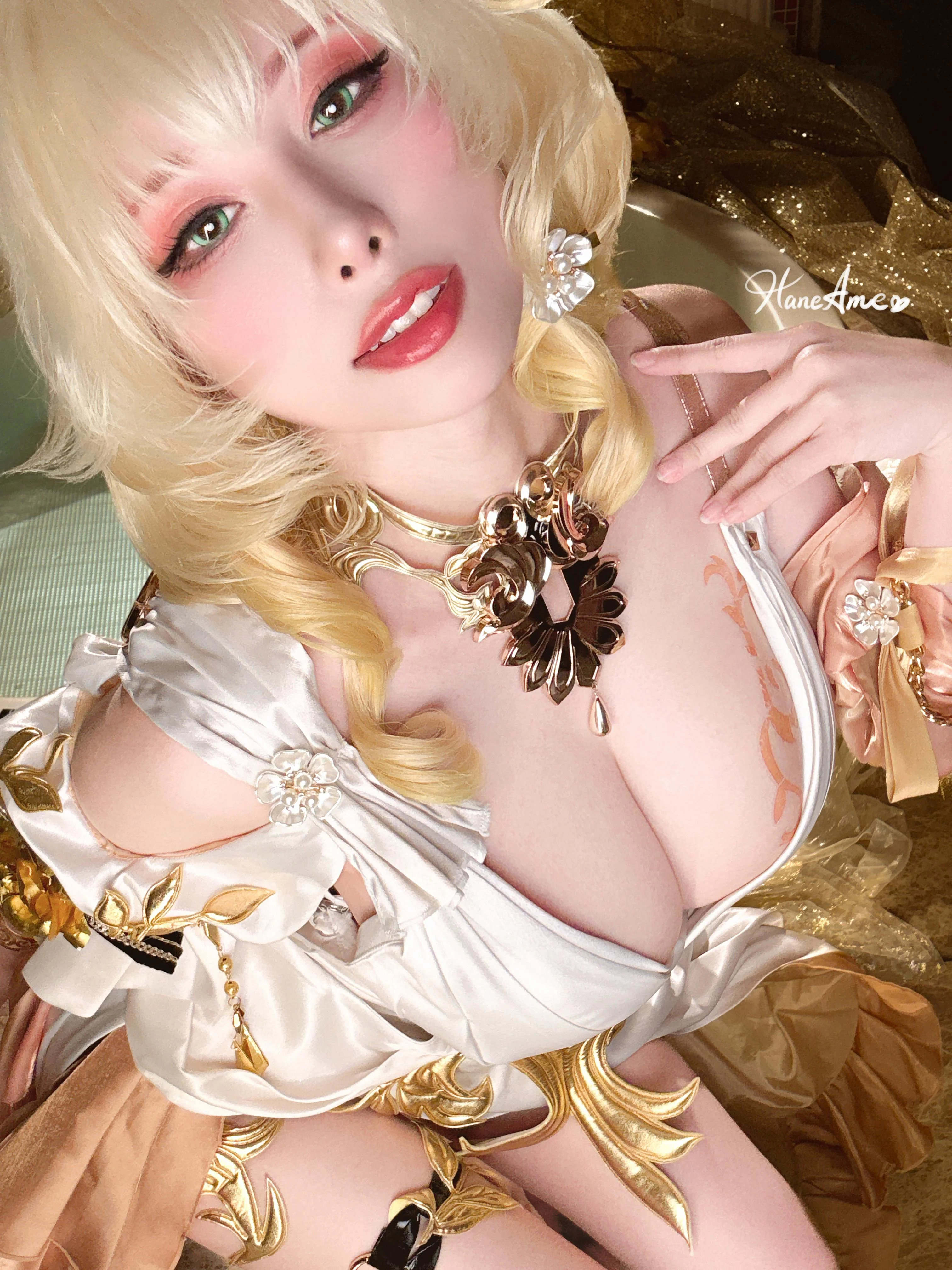 hane ame, aglaea (honkai: star rail), honkai: star rail, honkai (series), absurdres, cosplay photo, highres, photo (medium), 1girl, aglaea (honkai: star rail) (cosplay), artist name, blonde hair, breasts, cleavage, cosplay, female focus, large breasts, solo