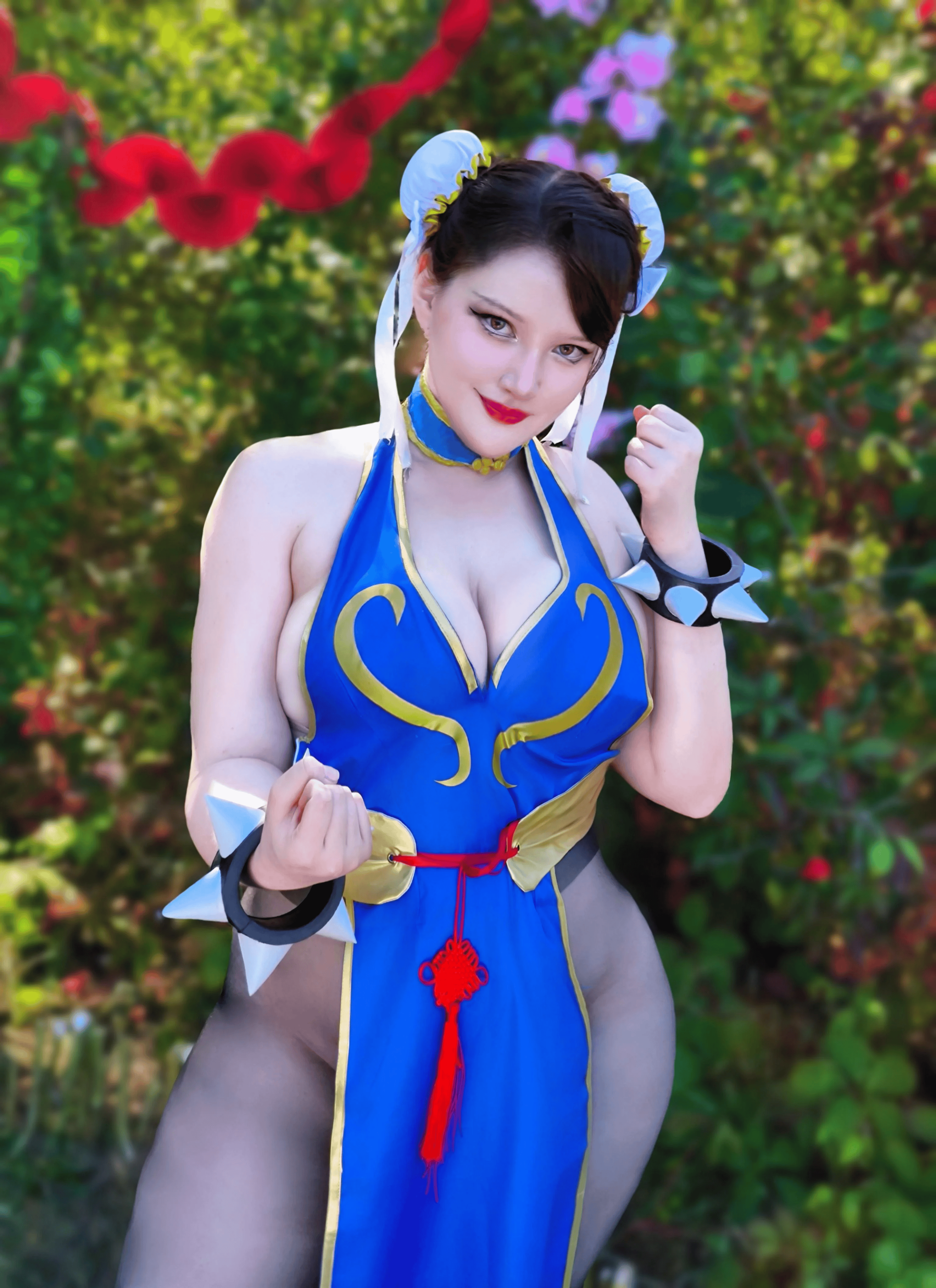chun-li, capcom, real life, street fighter, street fighter iv (series), cosplay photo, photo (medium), 1girl, blurry, blurry background, bracelet, breasts, brown hair, chinese clothes, chun-li (cosplay), cosplay, double bun, female focus, hair bun, jewelry, large breasts, mi samura, official alternate costume, outdoors, pantyhose, see-through pantyhose, solo, spiked bracelet, spikes, thighs