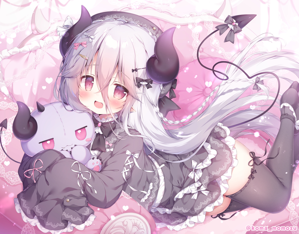 momozu komamochi, monster company, commentary request, 1girl, black dress, black horns, black tail, black thighhighs, blush, demon horns, demon tail, dress, grey hair, hair between eyes, holding, holding stuffed toy, horns, koakuma (monster company), long hair, long sleeves, looking at viewer, open mouth, pink eyes, pointy ears, sleeves past fingers, sleeves past wrists, solo, stuffed toy, tail, thighhighs