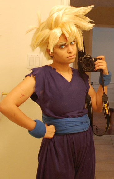 son gohan, dragon ball, photo (medium), tagme, blonde hair, blue eyes, camera, cosplay, holding, holding camera, house, super saiyan, torn clothes