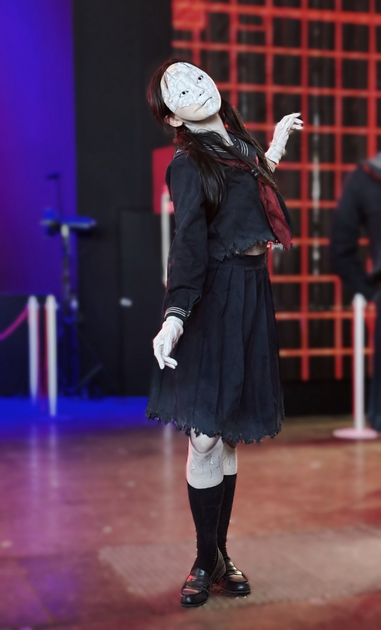 ayakakashi, real life, silent hill (series), silent hill f, highres, photo (medium), ayakakashi (cosplay), bent over, black eyes, black hair, black serafuku, black shirt, black skirt, breasts, cosplay, expressionless, full body, japanese (nationality), logo, midriff, navel, neckerchief, red neckerchief, rope, rope marks, school uniform, serafuku, shirt, short hair, skirt, torn clothes, torn shirt, torn skirt, underboob