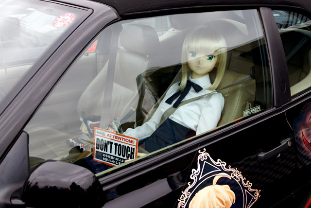 artoria pendragon (fate), saber (fate), fate/stay night, fate (series), photo (medium), 00s, 1girl, car, car interior, doll, female focus, motor vehicle, solo