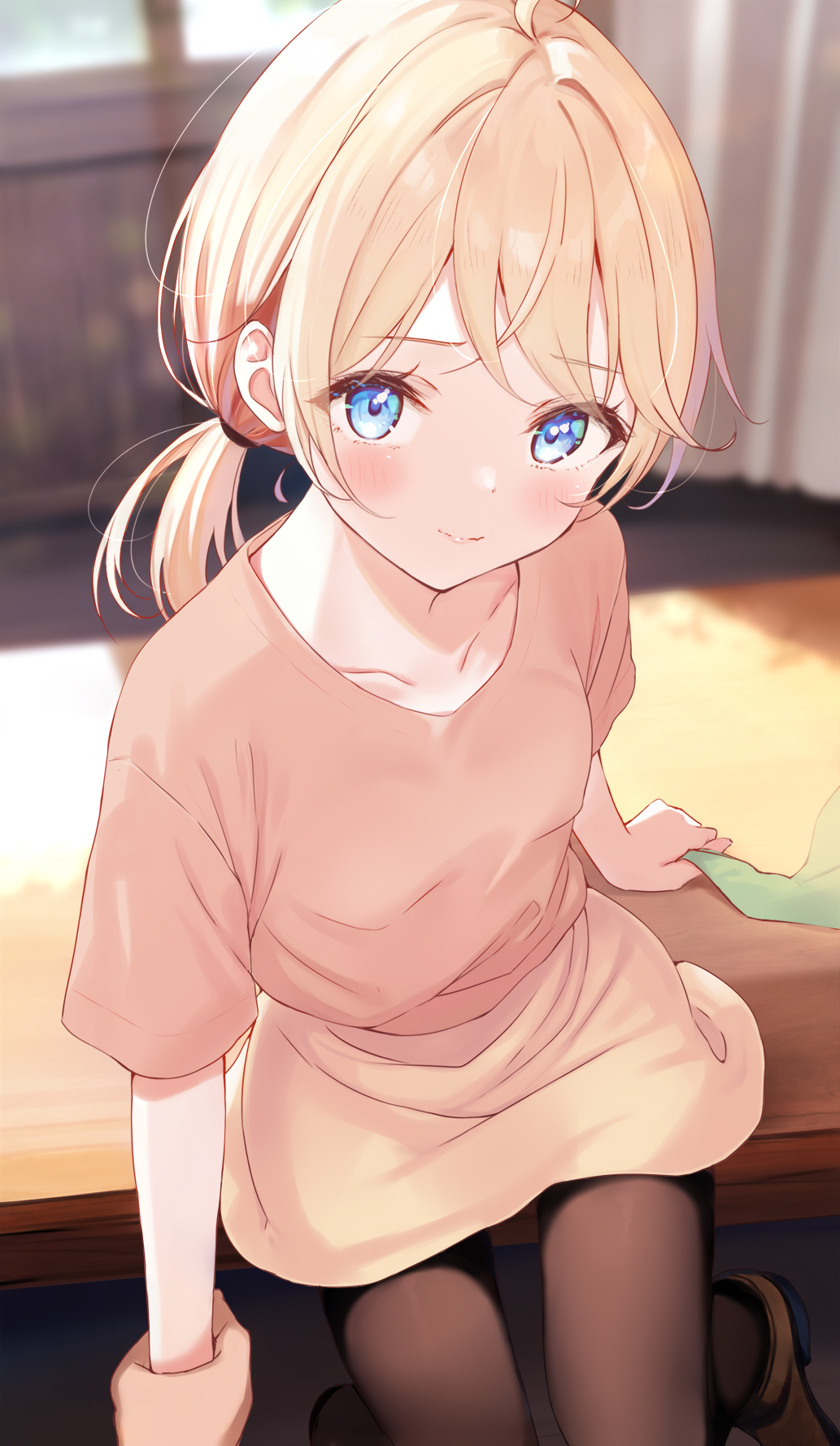 komone ushio, original, commentary request, highres, 1girl, 1other, black pantyhose, blonde hair, blue eyes, blurry, blurry background, blush, brown shoes, closed mouth, collarbone, crossed bangs, depth of field, holding another's wrist, indoors, long shirt, looking at viewer, medium hair, orange shirt, out of frame, pantyhose, parted bangs, shirt, shoes, short sleeves, sitting, smile