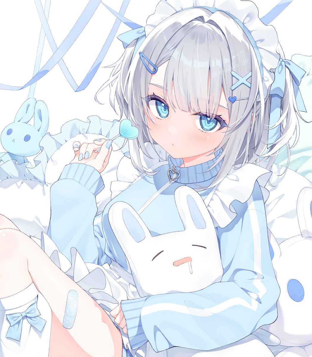 ryouka (suzuya), original, highres, 1girl, apron, bandaid, bandaid on leg, blue eyes, blue jacket, blue nails, blue ribbon, blue track suit, candy, closed mouth, feet out of frame, food, frilled apron, frilled pillow, frills, hair intakes, hair ornament, hair ribbon, hairclip, hand up, heart, heart-shaped food, holding, holding candy, holding food, holding stuffed toy, jacket, jersey maid, kneehighs, leg bow, long sleeves, looking at viewer, loose socks, maid, maid apron, maid headdress, pillow, ribbon, short hair, sitting, sleeves past wrists, socks, solo, stuffed animal, stuffed rabbit, stuffed toy, tenshi kaiwai, track jacket, track suit, turtleneck, turtleneck jacket, unconventional maid, white apron, white hair, white socks, x hair ornament, zipper pull tab